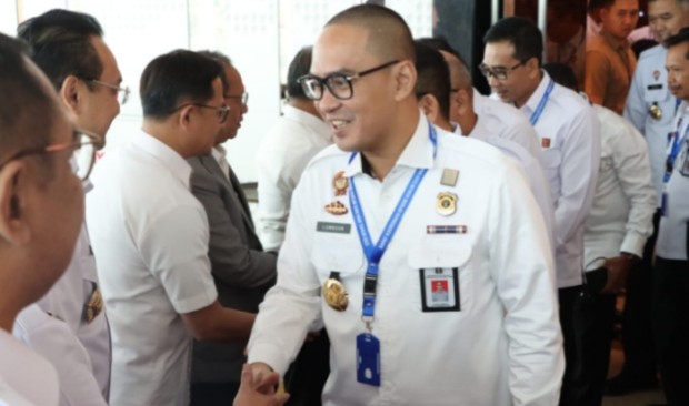 Ronald Lumbuun Teken Komitmen Bersama Pengembangan Kompetensi SDM Kemenkumham