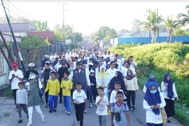 2.000 Warga Marusu Jalan Santai Bersama Bupati Chaidir Syam